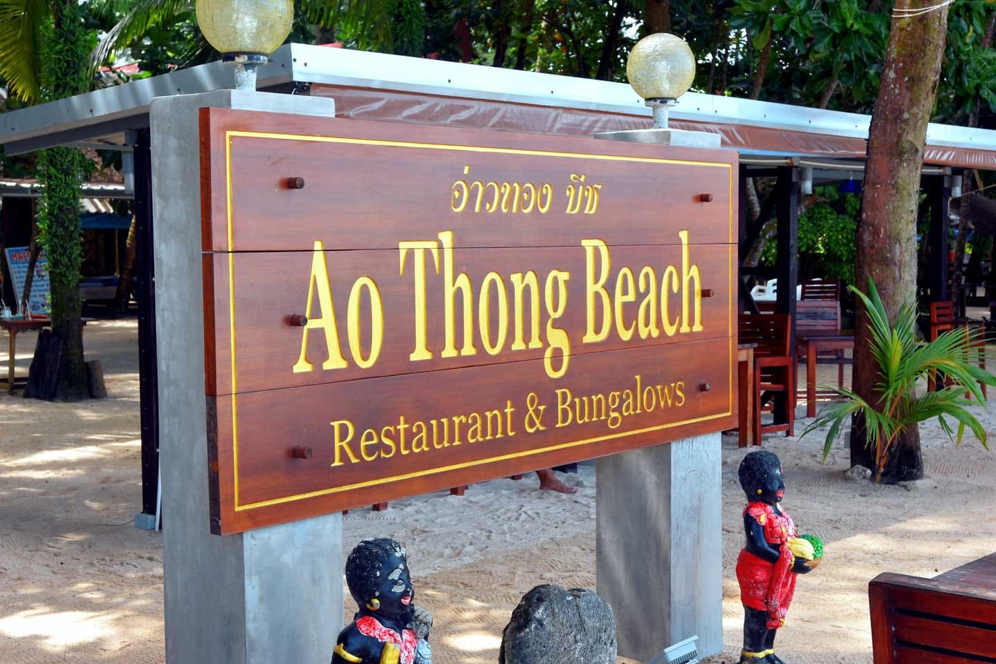 Sign by the beach front restaurant